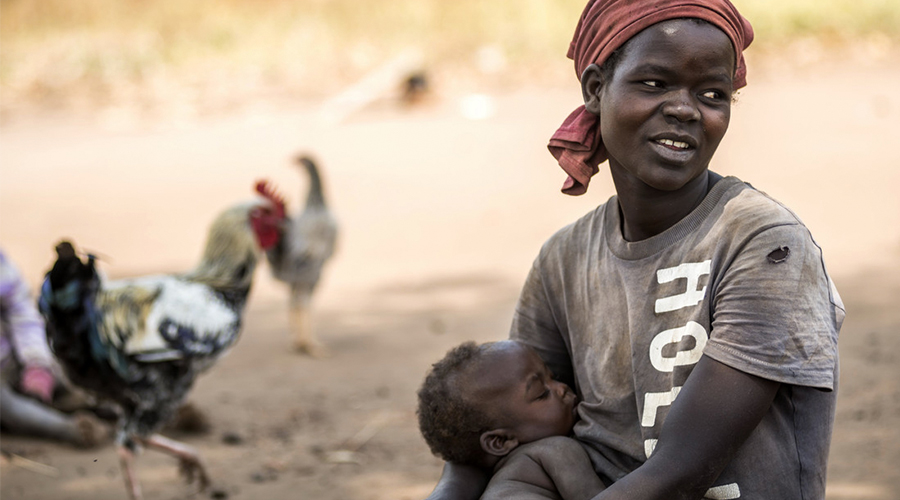 grace-aloyo-with-one-of-her-five-children-in-lamwo-district-uganda-panama-papers.jpg