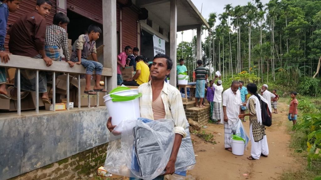 Humanitarian assistant to flood affected communities in Assam. An Oxfam hygiene and shelter kit distribution. Photo credit: Oxfam India