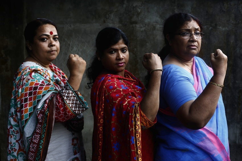 Pollisree officials pose as ‘ empowered women’ in Rangpur, Bangladesh, as part of Oxfam Canada’s Creating Spaces project