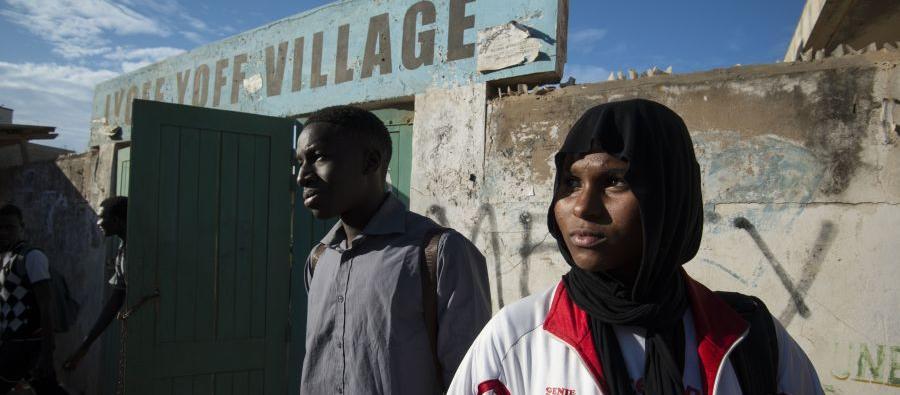 High school students Mamadou Thioye (19), at left, and Aisha* (16). Both are participants in the ‘Connecting 4 Life’ program that helps young people in Senegal learn about human sexuality through an online education platform. Photo by: Brett Eloff / Oxfam