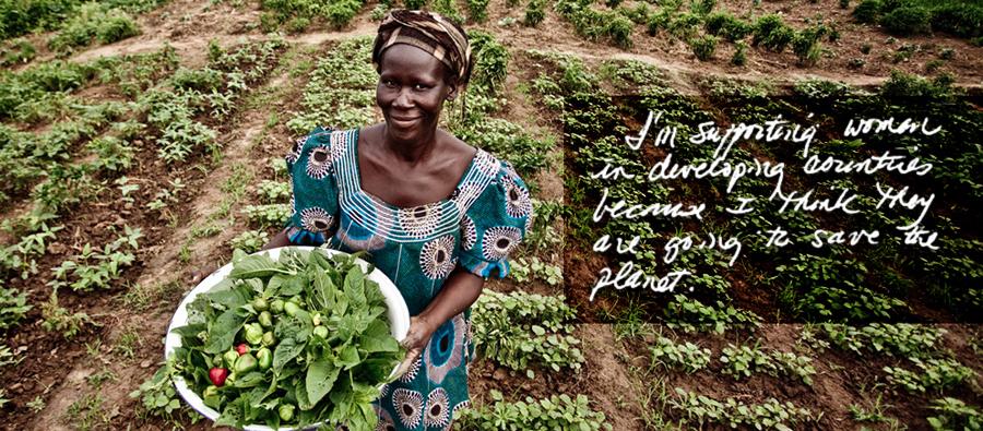 Woman holding basket of greens with thank you message.