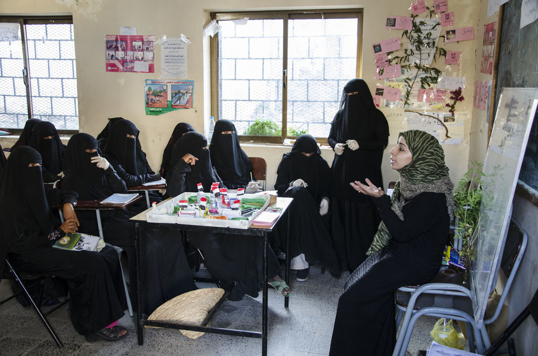 OxfamGB_88769_The Amal programme Women in Yemen sitting around table