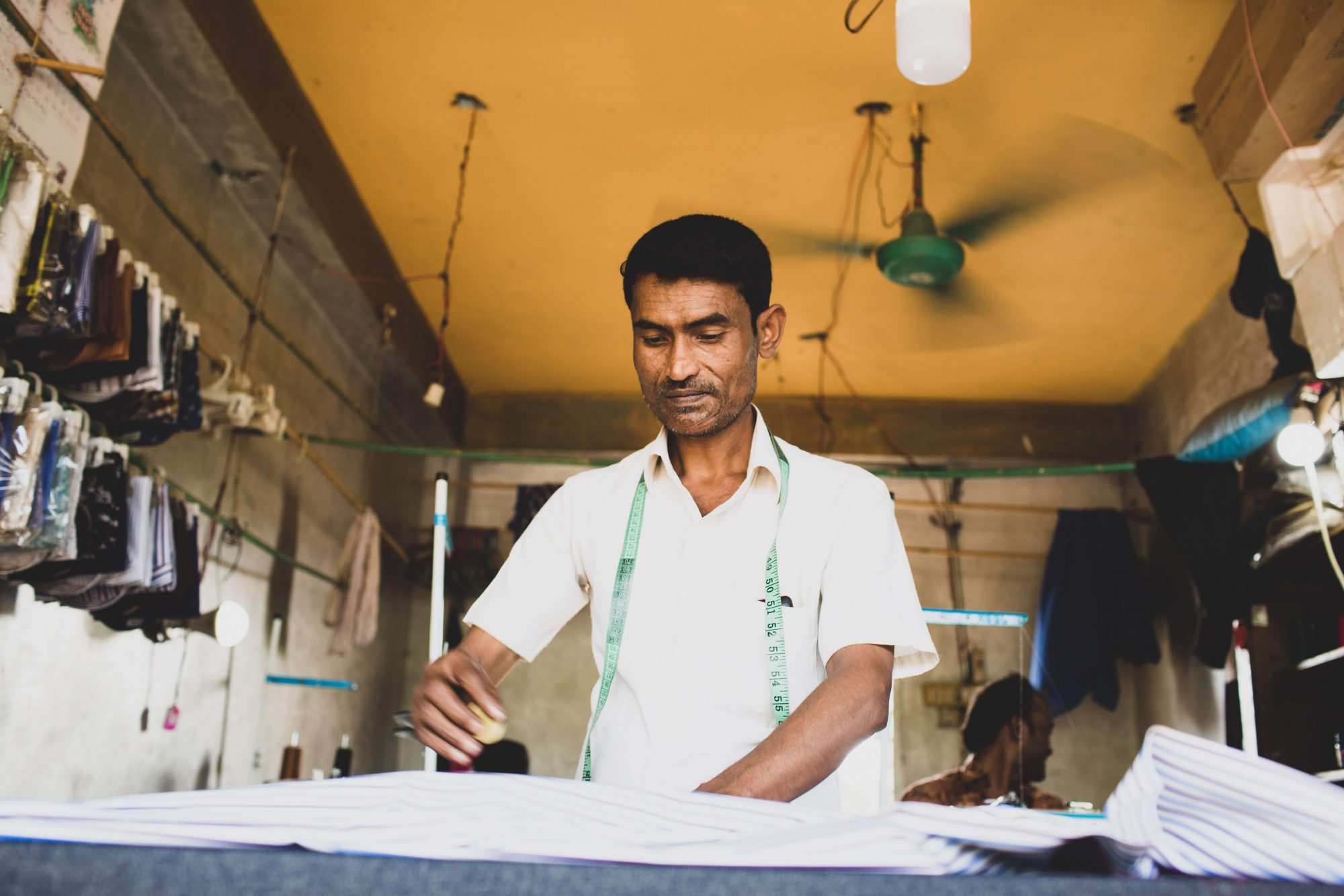 Noor Mohammed in his shop Photo: Caroline Leal/Oxfam