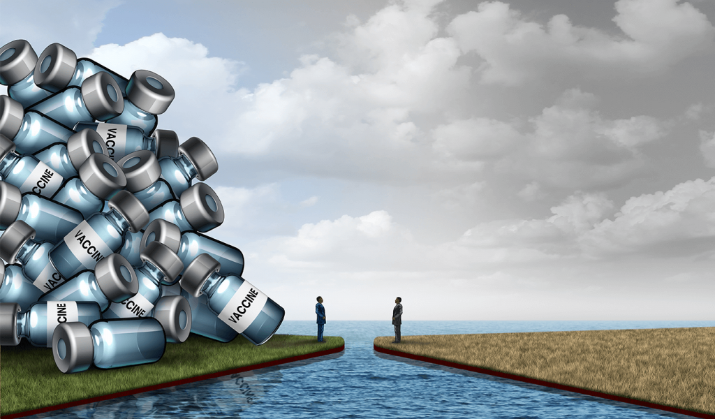 Illustration of two people standing on land that is separated by water. On the left piece of land, behind the person there is a stockpile of vaccines. The grass is also slightly greener than the right side. On the land to the right, there are no vaccines and the grass is slightly yellower. The sky toward the left is also slightly bluer than the sky on the right which is gray.