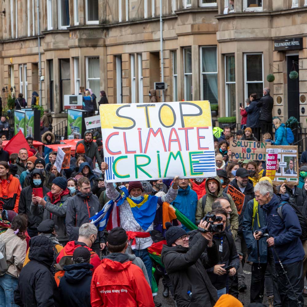A crowd of protestors during a climate march.