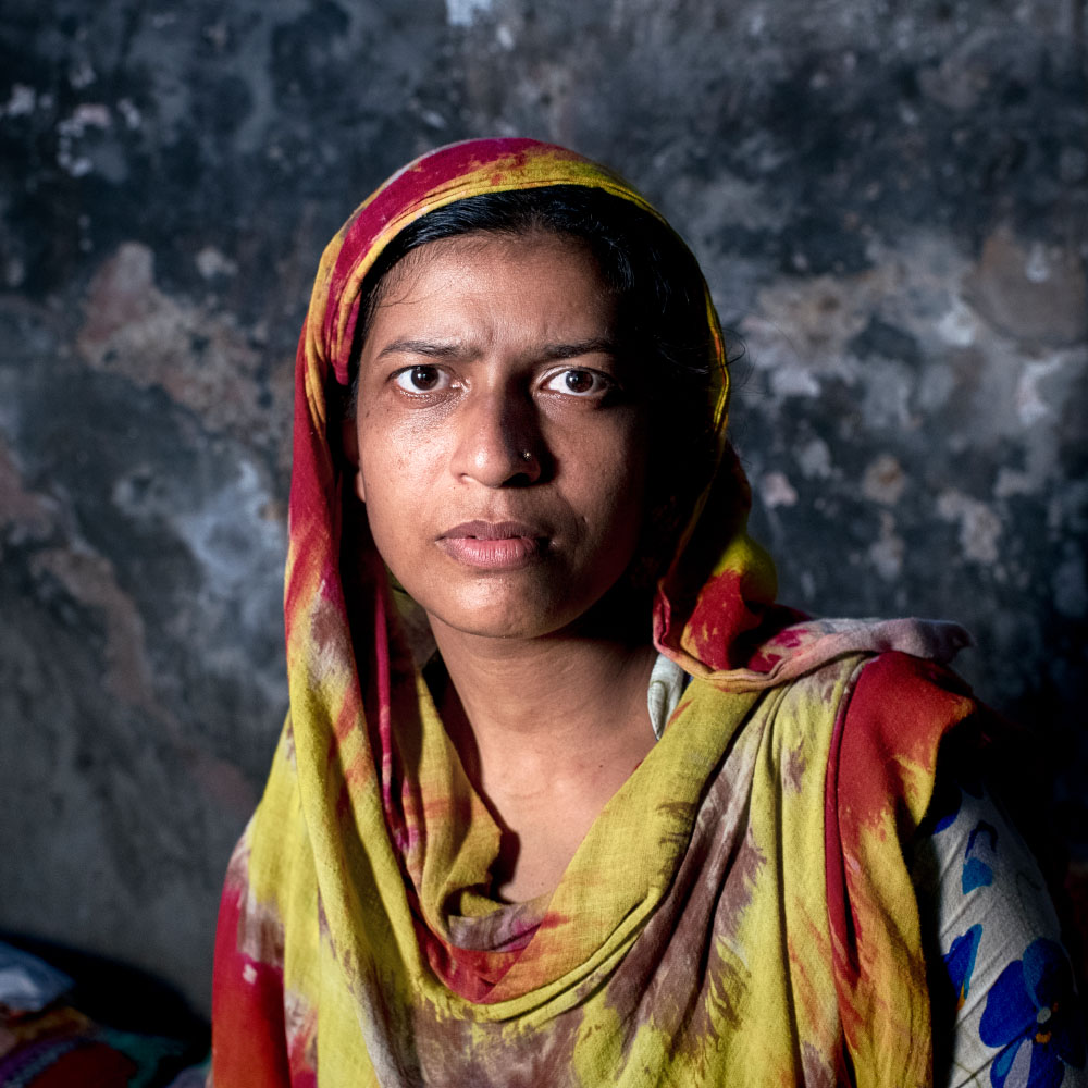 GenderJust_Hero2 A woman with a serious expression faces the camera.