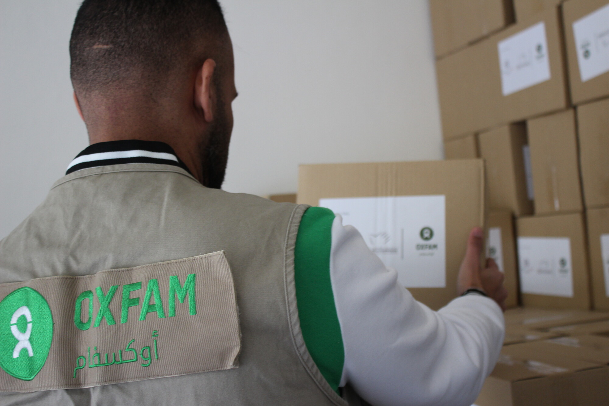 Oxfam staff distributing hygiene kits in Beirut