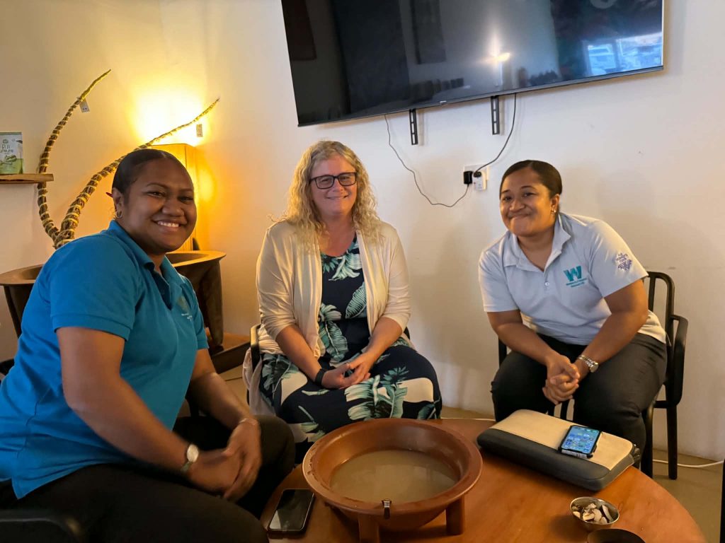 Erin Kiley (centre) sharing Talanoa Over Kava. Photo: Varea Romanu/ Oxfam