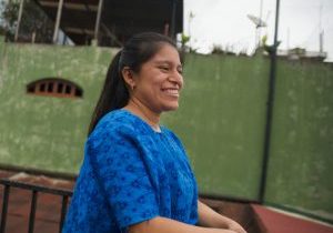 A profile image of a smiling young woman.